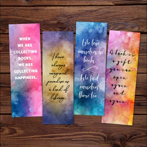 May include: Four colorful bookmarks with watercolor backgrounds and inspirational quotes about books and reading. The quotes are: "When we are collecting books, we are collecting happiness.", "I have always imagined paradise as a kind of library.", "We lose ourselves in books. We find ourselves there too.", and "A book is a gift you can open again and again."