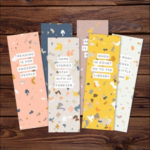May include: Set of five colorful bookmarks with terrazzo patterns and inspirational quotes about reading. The quotes are: "Reading is for awesome people", "Some stories stay with us forever", "When in doubt go to the library", "Reading is a superpower", and "So many books so little time".