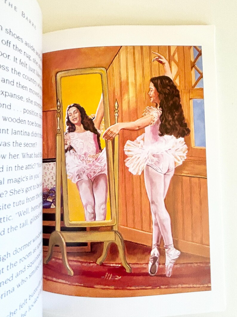 May include: A book illustration depicting a dancer with long dark hair wearing a pink leotard and tutu, standing before a tall, gold-framed floor mirror. The dancer is reflected in the mirror, which is positioned on a red rug in a wood-paneled room.