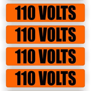 May include: Six orange warning labels with black text that reads "110 VOLTS".