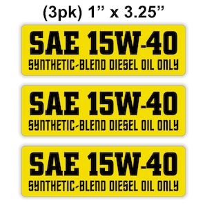 May include: Three yellow rectangular stickers with black text that reads "SAE 15W-40 SYNTHETIC-BLEND DIESEL OIL ONLY". The stickers are 1 inch by 3.25 inches.