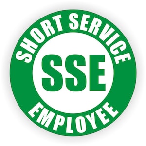 May include: Green and white round sticker with the text "Short Service Employee" and the letters "SSE" in the center.