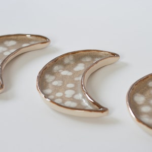 ceramic moon ring holder with brown lip and white stars, ceramic jewelry storage