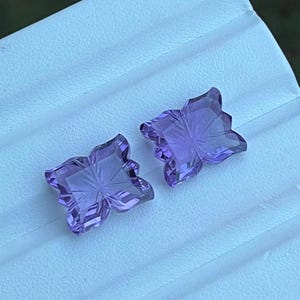 Natural amethyst fancy cut pair, fantasy cut gemstone.