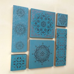 Intricate,3 D wall art in silver and duck egg blue