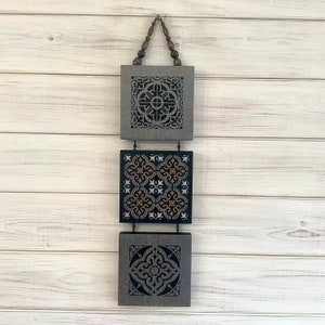Moroccan style wall decor in black,silver and bronze