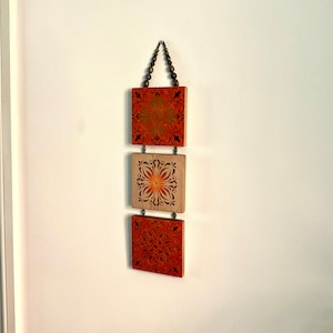Vertical wall hanging, hand painted in terracotta, orange, bronze and brown