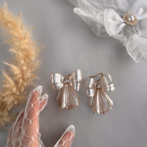 Elegant Bow Earrings with Pearl Accent Handmade Statement Jewelry big gold earrings bow bridal long earrings unique handmade