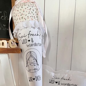 Cheeky girl Lotta, elegant linen school cone. Be cheeky and WILD!