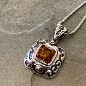 Amber Pendant with Sterling Silver on Silver Snake Chain