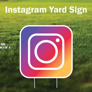 May include: A yard sign featuring the Instagram logo. The logo is a square with rounded corners and is made up of a gradient of pink, orange, and yellow. The logo is outlined in white and has a white circle in the center with a small white dot in the center of the circle. The sign is 20 inches wide and 20 inches high.