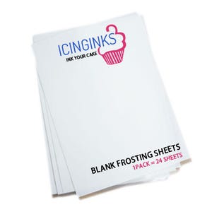 May include: A stack of 24 white blank frosting sheets for edible printing. The sheets are made by Icinginks, a company that specializes in edible ink and frosting sheets. The text "BLANK FROSTING SHEETS 1 PACK = 24 SHEETS" is printed on the bottom of the stack.