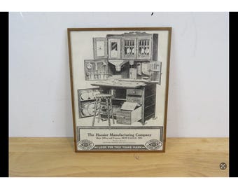 Anuncio impreso enmarcado C3 de la marca HOOSIER Manufacturing, gabinetes vintage, decoración de cocina