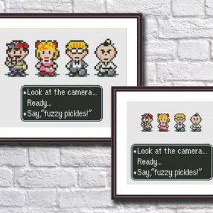 May include: Cross-stitch pattern featuring four pixelated characters from the video game Earthbound. The characters are Ness, Paula, Jeff, and Poo. The pattern includes the text "Look at the camera... Ready... Say, "fuzzy pickles!"