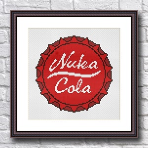 May include: Red and white cross-stitch pattern of a Nuka Cola bottle cap. The bottle cap is red with a white Nuka Cola logo.