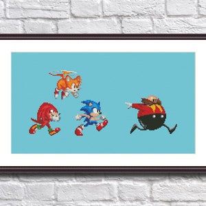 May include: A cross-stitch pattern featuring four characters from the video game Sonic the Hedgehog. The characters are Sonic, Tails, Knuckles, and Dr. Eggman. The characters are all running and jumping in a blue background.
