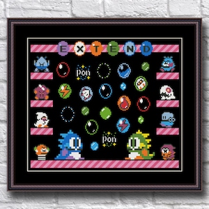 May include: Cross stitch pattern featuring a retro video game theme with pixelated characters and the word "EXTEND" at the top. The pattern includes a variety of colorful characters and bubbles.