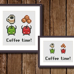 May include: Cross stitch pattern featuring two pixelated characters, one green and one red, holding a cup of coffee and a plate of cookies. The text "Coffee time!" is below the characters.