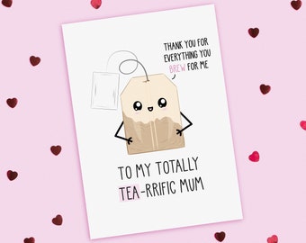 May include: A white card with a cartoon tea bag illustration. The tea bag has a smiling face and says "Thank you for everything you brew for me." The card also says "To my totally tea-rrific mum".