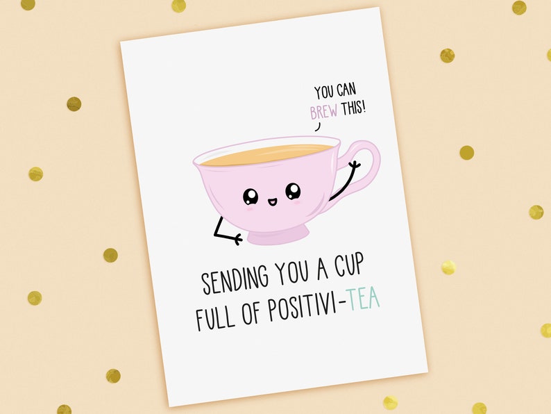 A funny good luck card with a hand drawn image of a pink cup of tea. The cup has a speech bubble saying you can brew this. The card caption is: Sending You A Cup Full Of Positive-Tea