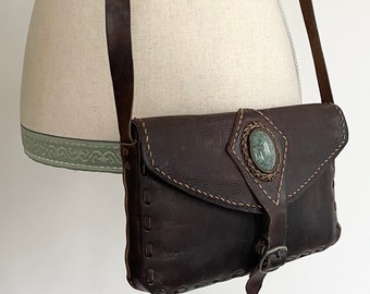 leather purse with turquoise stone