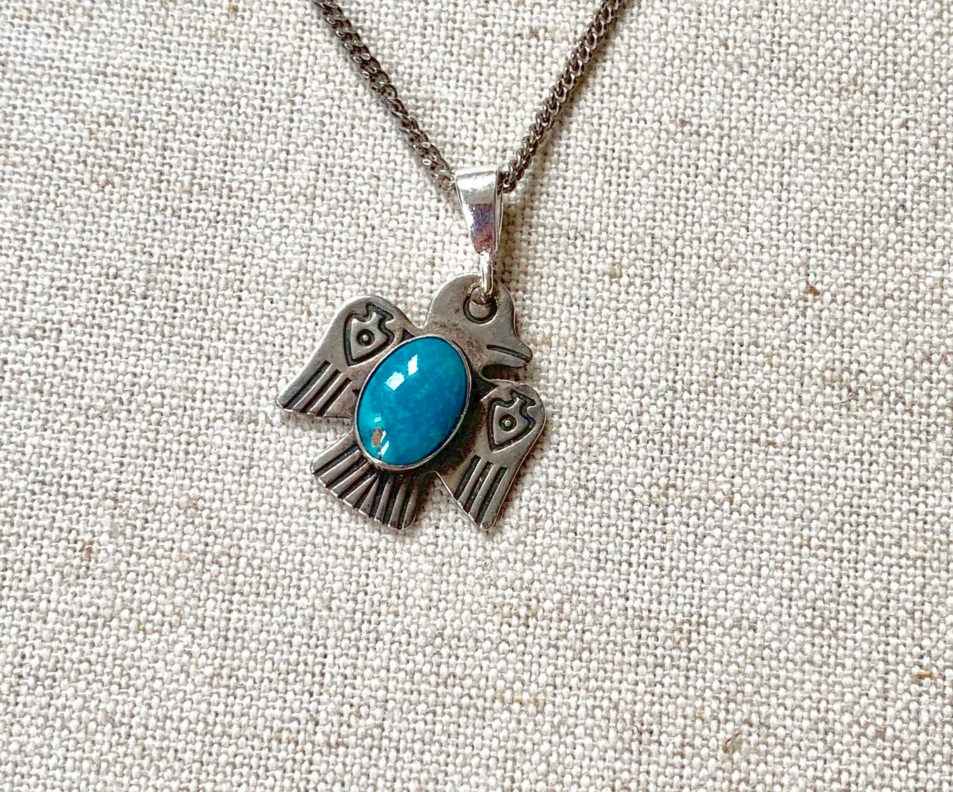 Turquoise thunderbird pendant Clearance