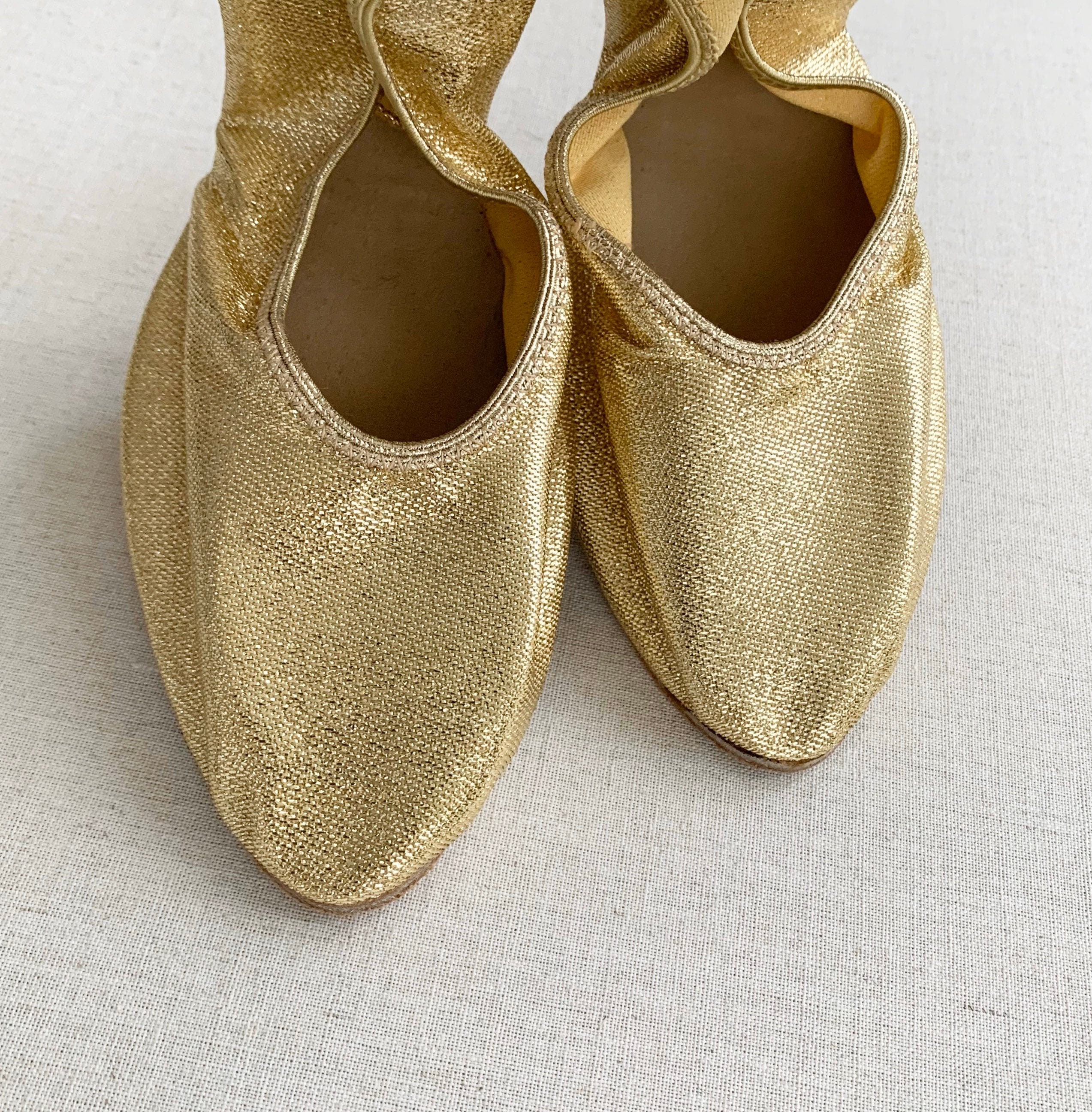 gold lame slippers