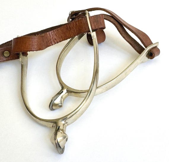 Vintage Nickel Spurs: Worn Leather Straps, Equestrian Ranch Decor
