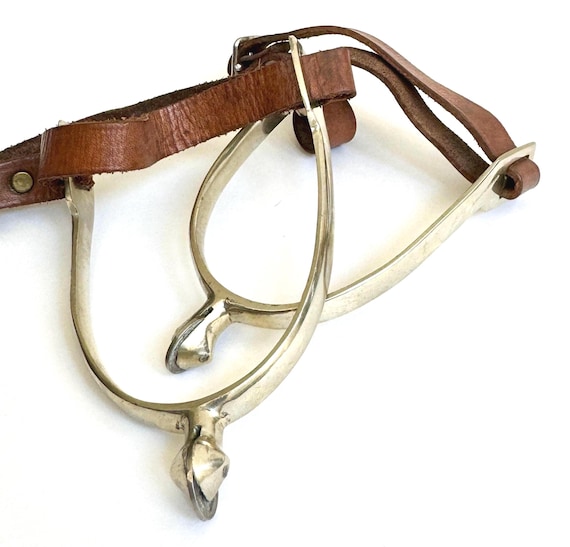 Vintage Nickel Spurs: Worn Leather Straps, Equestrian Ranch Decor