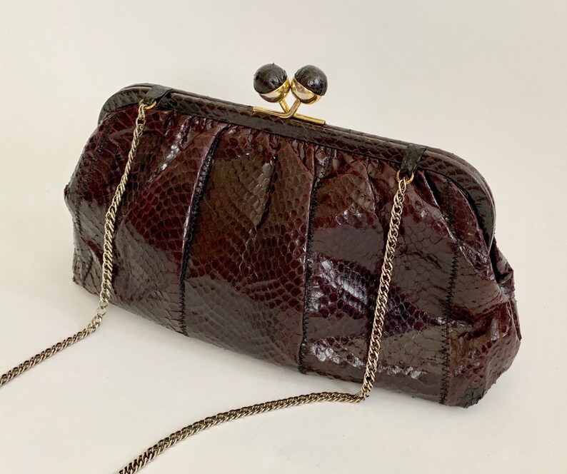 aubergine clutch bag