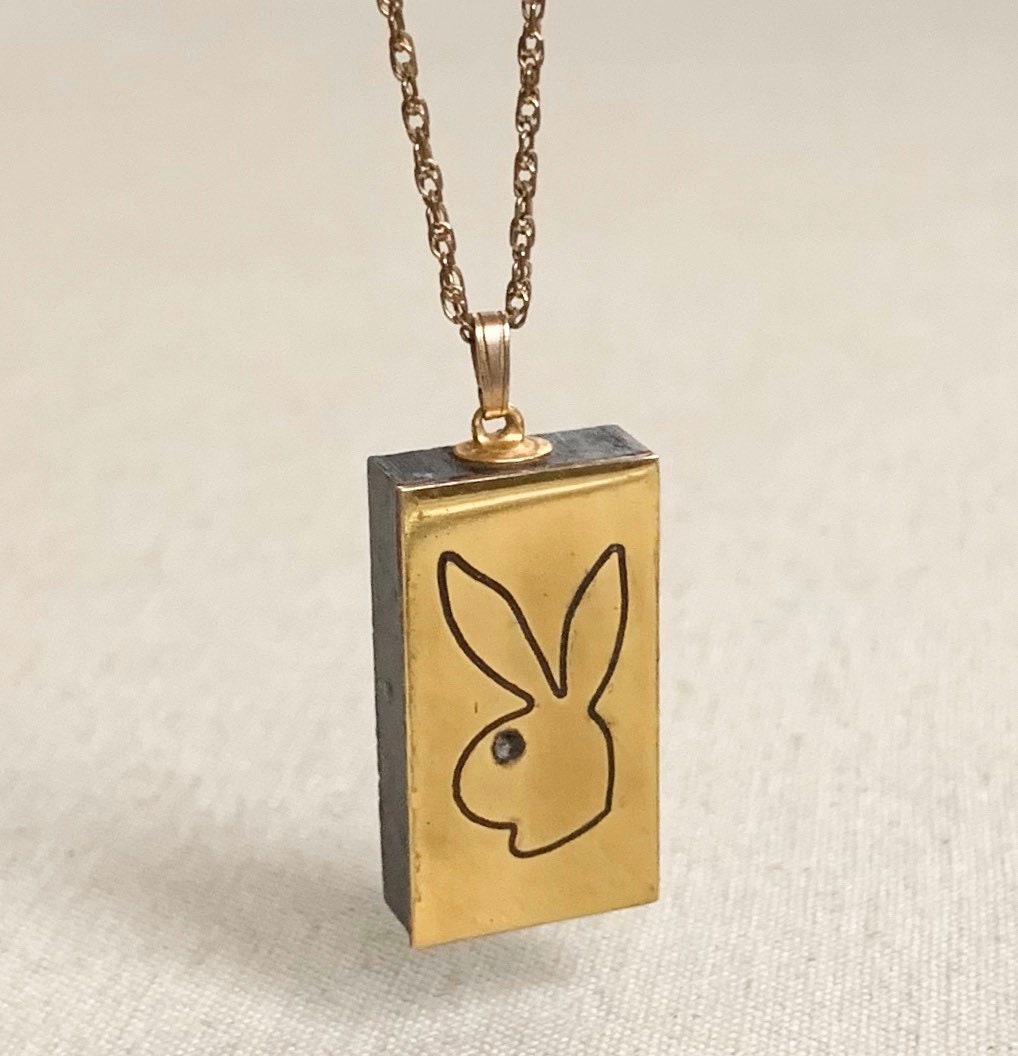 Goldtone Double Chain CZ Playboy Bunny Necklace - Spencer's
