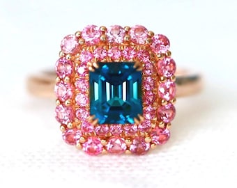 Anello con tormalina lagunare taglio smeraldo: alone di spinello rosa, oro rosa 14 carati