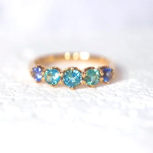 Teal Sapphire Eternity Band in 14Kt Yellow Gold Sapphire Minimal Green Sapphire with precision cut sapphires 1.2ct. Size 7. image 2