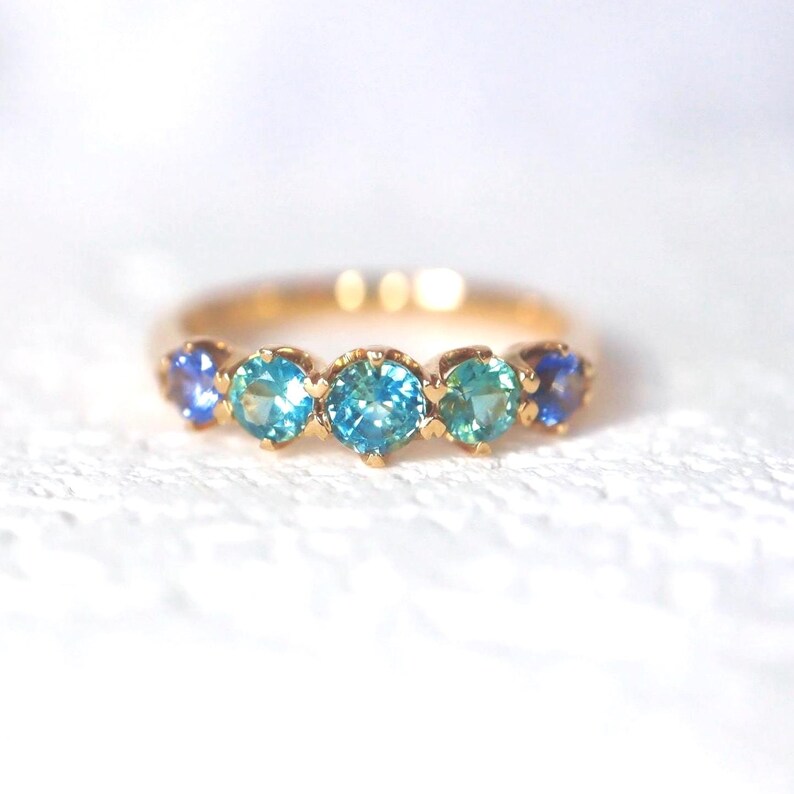 Teal Sapphire Eternity Band in 14Kt Yellow Gold Sapphire Minimal Green Sapphire with precision cut sapphires 1.2ct. Size 7. image 2