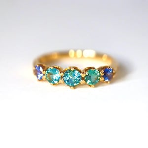 Teal Sapphire Eternity Band in 14Kt Yellow Gold Sapphire Minimal Green Sapphire with precision cut sapphires 1.2ct. Size 7. image 1