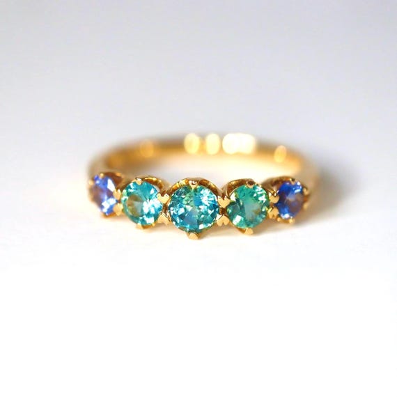 Teal Sapphire Eternity Band in 14Kt Yellow Gold Sapphire Minimal Green Sapphire with precision cut sapphires 1.2ct. Size 7.