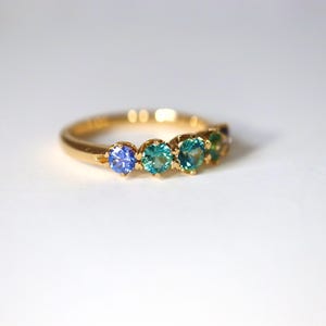Teal Sapphire Eternity Band in 14Kt Yellow Gold Sapphire Minimal Green Sapphire with precision cut sapphires 1.2ct. Size 7. image 10