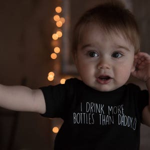 I Drink More Bottles Than Daddy Onesie