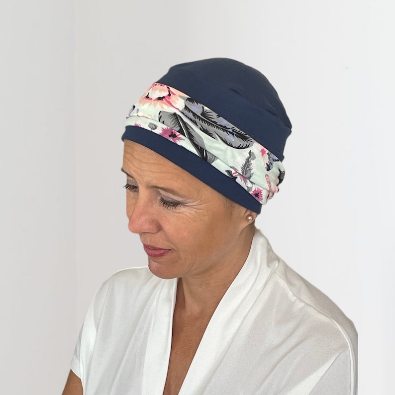 Comfortable hats for cancer patients with detachable headband. Versatile & flattering easy to wear chemo hat in a variety of colours Navy & Aqua HB