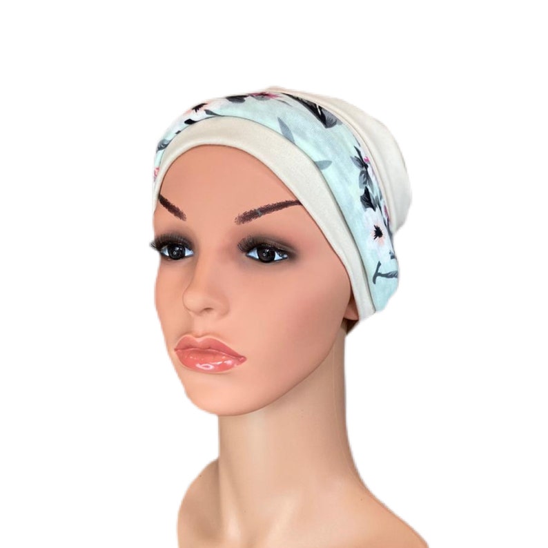 Comfortable hats for cancer patients with detachable headband. Versatile & flattering easy to wear chemo hat in a variety of colours Stone & Aqua HB