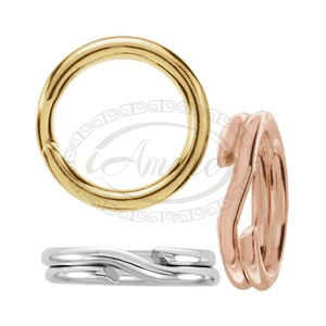 May include: Three jump rings in different finishes: gold, rose gold, and silver. The rings are all about 1 inch in diameter.
