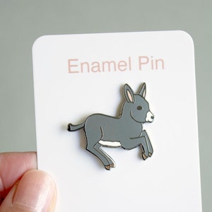 Prancing baby donkey hard enamel pin