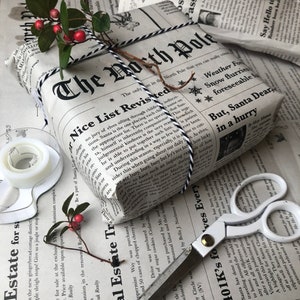 eco-friendly black and white Christmas wrapping paper sheets from the North Pole Newspaper perfect gift from Santa on Christmas RECYCLED