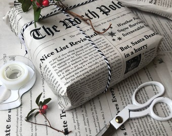 eco-friendly black and white Christmas wrapping paper sheets from the North Pole Newspaper perfect gift from Santa on Christmas RECYCLED