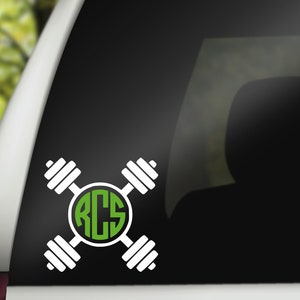 May include: White vinyl decal of a barbell with a green circle in the center. The circle contains the letters "ACS" in white.