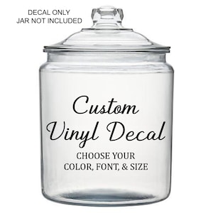 May include: A clear glass jar with a lid featuring black text that reads DECAL ONLY JAR NOT INCLUDED at the top and Custom Vinyl Decal CHOOSE YOUR COLOR, FONT, & SIZE in the center. This is a display for a customizable vinyl decal product.