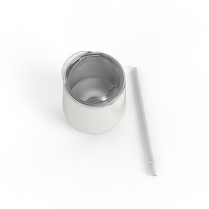 May include: A white stainless steel tumbler with a clear lid and a white straw. The tumbler is designed to look like a wine glass.