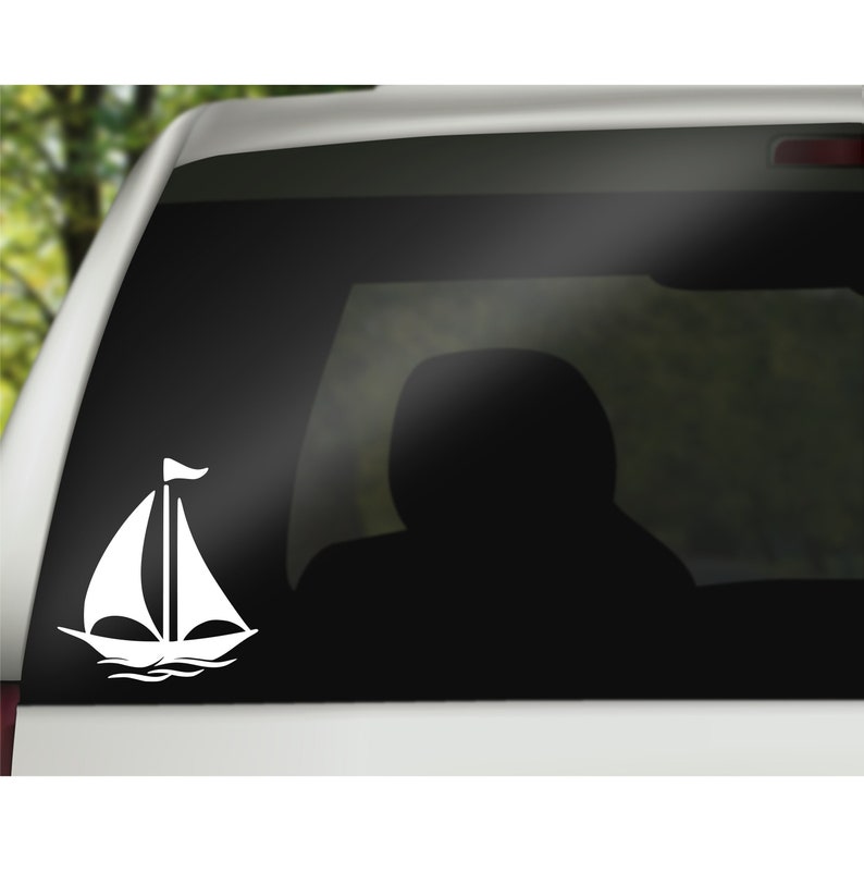 May include: A white silhouette of a sailboat with a sail and a flag on a black background.