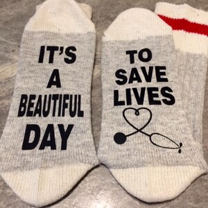 It&#39;s A Beautiful Day ... To Save Lives (Word Socks - Funny Socks - Novelty Socks) - with a stethoscope shaped like a heart