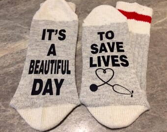 It's A Beautiful Day ... To Save Lives (Word Socks - Funny Socks - Novelty Socks) - with a stethoscope shaped like a heart